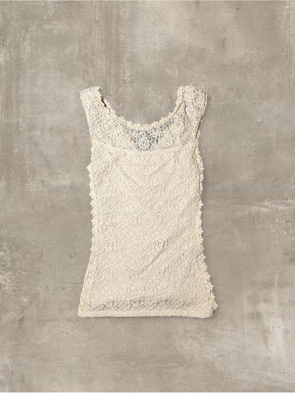 White lace tank top with ruffled trim